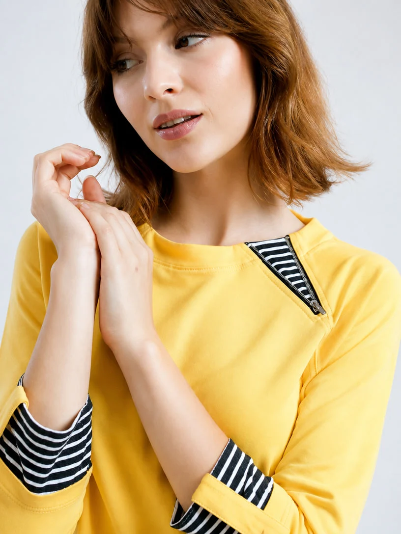 Yellow knit top with contrast cuffs