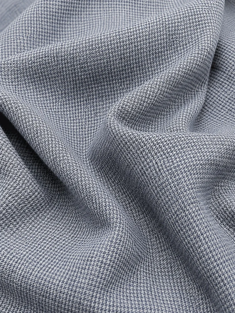 Close-up of blue textured knit fabric